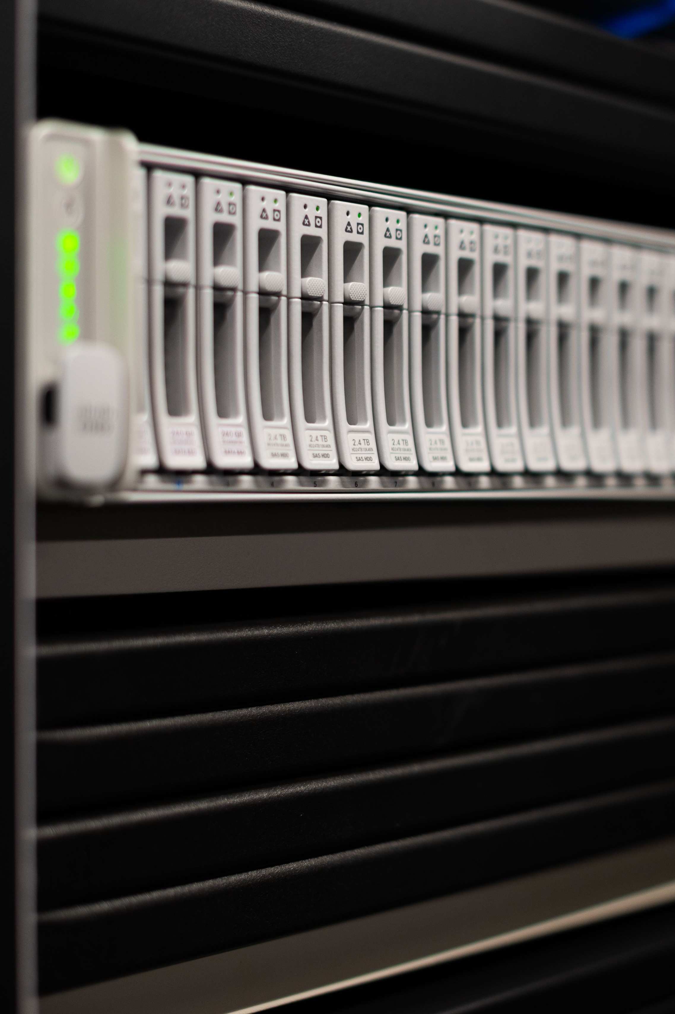 Server racks with network cabling in a data hall